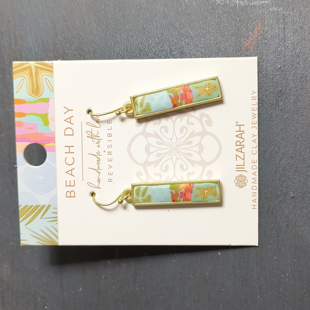 These earrings are so much fun You can turn them over through a little loop You'